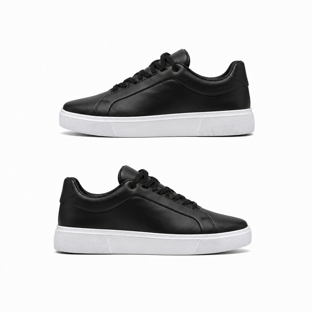 Black leather sneakers with a white sole, side view